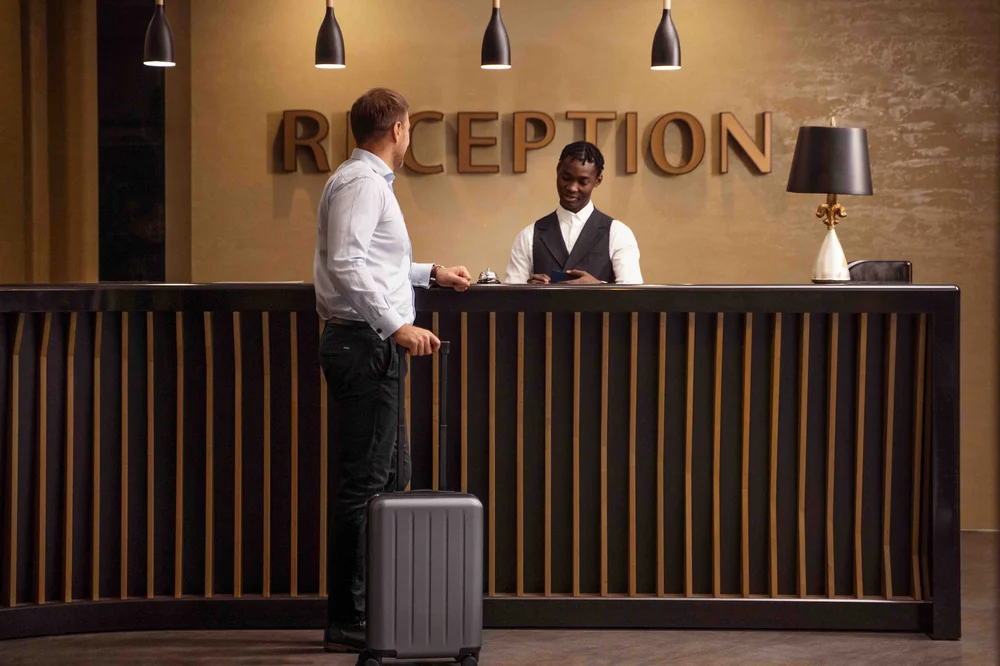 Guest arriving at a hotel reception